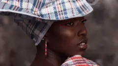Model in Ghana Must Go fabrics