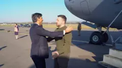 Риши Сунак и Владимир Зеленский.