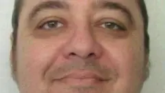 Kenneth Eugene Smith poses for a mugshot