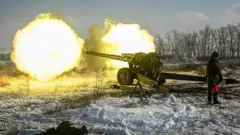 A Russian army service member fires a howitzer during drills at the Kuzminsky range in the southern Rostov region, Russia January 26, 2022