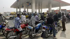 Okada people dey queue for filling station