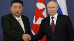 kim and putin