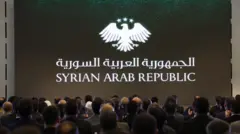 جانب من الحضور خلال حفل إطلاق الهوية البصرية الجديدة لسوريا 