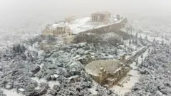 The Acropolis covered in snow in the Greek capital Athens