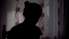 žena u senci