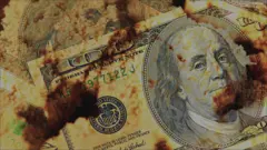 Nota de dólar cheia de areia