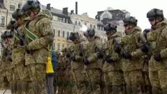 В годовщину начала войны в Украине проходят акции памяти погибших