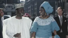 General Yakubu Gowon with im wife for UK (1973)