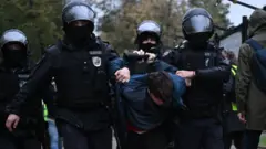 اعتقال رجل في روسيا