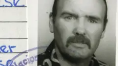 A young Peter McAleese's ID card during his mercenary days in Africa in the Seventies
