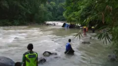 Police inside river