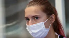 Belarusian athlete Krystsina Tsimanouskaya is seen at Haneda international airport in Tokyo, Japan August 1, 2021.