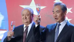 Комилов
