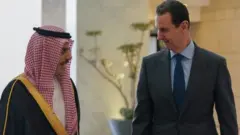 الرئيس السوري بشار الأسد ووزير الخارجية السعودي فيصل بن فرحان