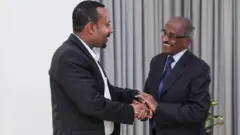 ቀዳማይ ሚኒስተር ኣብዪ ኣሕመድ (ጸጋም) ምስ ሚኒስተር ጉዳያት ወጻኢ ኤርትራ ኣቶ ዑስማን ሳልሕ (የማን)