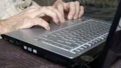 a man writing in keyboard