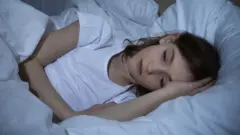 Girl trying to sleep