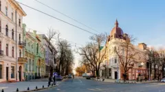 A pretty street with a row of colourful buildings