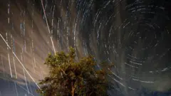More than 300 stacked digital images of long exposures show Perseid meteors and airplanes crossing the sky near the city of Kumanovo, Republic of North Macedonia on 12 August 2023