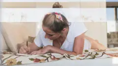 Woman writing diary