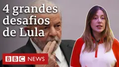 Lula com mão próxima à boca olha para o horizonte