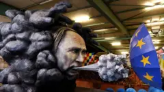 путін
