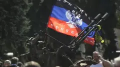 путін