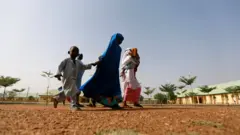 Stock foto of children and women for Jangebe, Zamfara state for March, 2021