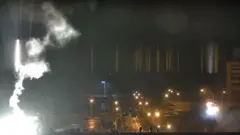 Nuclear plant with smoke plume
