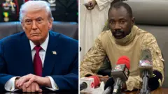 Donald Trump wear blue suit wit white shirt and red tie wit blue designs while Assimi Goïta weat army camouflage wit three microphones for im front