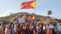 ኣብ ሱዳን ዘለው ተጋሩ ስደተኛታት ናብ ዓዶም ክምለሱ ዝጠልብ ሰልፊ ኣካይዶም