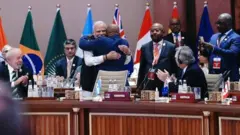 Modi ahoberana n'umukuru w'Ubumwe bwa Afrika akongera akaba umukuru w'igihugu ca Comores Azali Assoumani