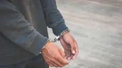 Foto of man wey dem arrest