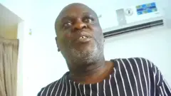 Ông Charles Mwesigwa