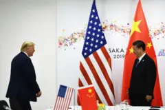 Chinese President Xi Jinping (R) and US President Donald Trump attend their bilateral meeting on the sidelines of the G20 Summit in Osaka on June 29, 2019