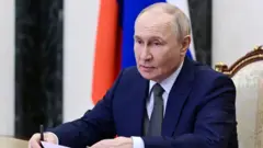 Путін