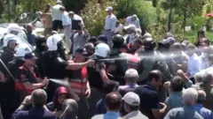 درگیری پلیس با مجاهدین خلق در اردوگاه اشرف