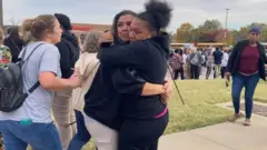 Pipo embrace outside di school
