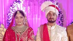 Sonam and Raja Raghuvanshi pictured in traditional Indian attire at their wedding