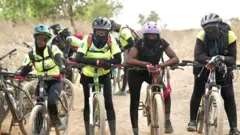 Women wey dey do mountain biking for Abuja