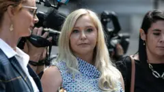 Virginia Giuffre stand outside federal court for New York, on 27 August 2019 