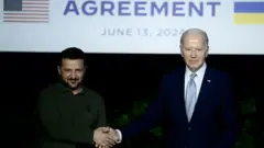 Зеленський і Байден