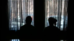 Man and woman in dark