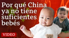 Dos bebés con fondo rojo