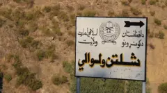 عکس لوحه ولسوالی شلتن ولایت کنر 