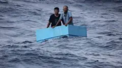 Pescadores no México.