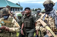 Willy Ngoma akikijwe n'abasirikare