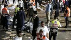 Medics and rescue workers at the scene of the Lag B'Omer festival