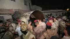 صورة لمكان انفجار ناقلة غاز انفجرت بالقرب من ملعب لكرة القدم في شمال شرق بغداد