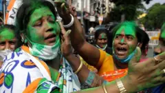 TMC supporters celebrate their party's win in West Bengal